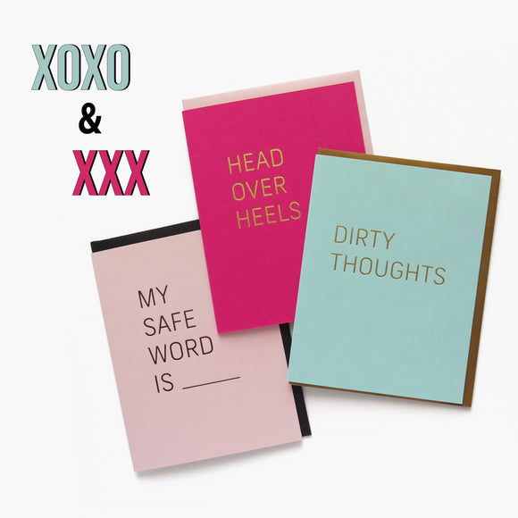 Trio of hot foil stamped Valentine's Day cards.  Light pink card that says My Safe Word is _____, Hot Pink card that says Head Over Heels, and a light blue card that says Dirty Thoughts.