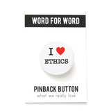 White round pinback button that reads I Love Ethics, love being a red heart. Pinned to Word For Word branded backing card, What We Really Love.