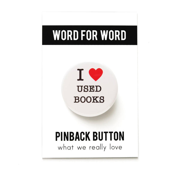 Round white pinback button that reads I LOVE USED BOOKS in 3 lines, with 