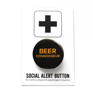 Round pinback button that says BEER CONNOISSEUR. Goldenrod text on a black background