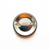Metal pinback of a pinback button