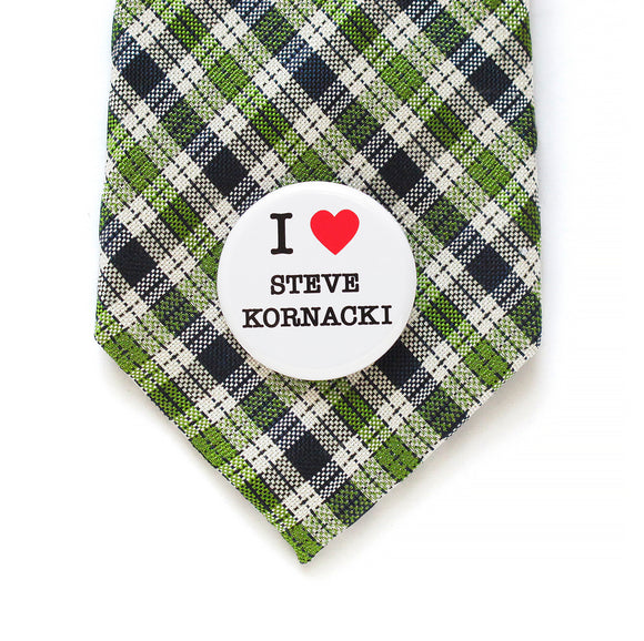 I heart Steve Kornacki pinback button on a green and blue plaid necktie.