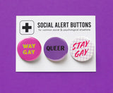 Three round pinback buttons on a Social Alert Buttons backing card. Buttons left to right: A dark Pink button that reads WAY GAY in yellow text, A purple button that reads QUEER in black text, and a 1980's style lavender grid button that reads STAY GAY in pink script.