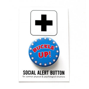 A round blue button with white stars around the edge, reading Buckle Up! in red text. Badge is on a Social Alert Button backing card. This is a button for the 2024 Election in the style of theSchool House Rock Bill Cartoon.