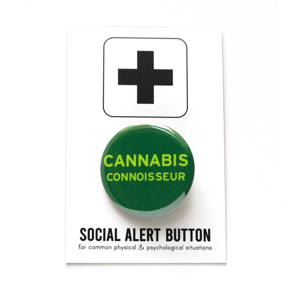 Round pinback button that says CANNABIS CONNOISSEUR. Light green text on a forrest green background. Button is on a Social Alert Button backing card.