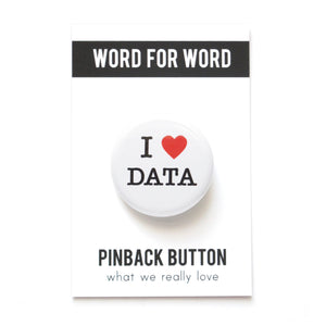 A round white button that reads I LOVE DATA with love being a red heart. On a Word For Word branded backing card, What We Really Love.