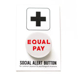 Round white pinback button that reads EQUAL PAY in red text. Badge is on a SOCIAL ALERT BUTTON backing card.