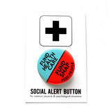 A round pinback button split between two colors, hospital scrubs green on the top and neon Advil red-orange on the bottom. The top of the button reads: FUND HEALTHCARE, The bottom reads: FUND SNAP, Feed People. Badge is on a Social Alert Button backing card.