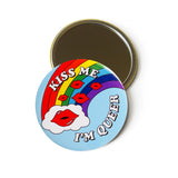 Product shot of 3" Round Pocket Mirror. The other side of the mirror has a light blue background with the words KISS ME I'M QUEER around the edges. There's also a graphic of a rainbow and kissing lips.