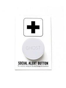 Round white pinback button that reads GHOST in a whisper of a gray san serif text. The button is pinned to a Social Alert Button backing card.