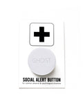 Round white pinback button that reads GHOST in a whisper of a gray san serif text. The button is pinned to a Social Alert Button backing card.