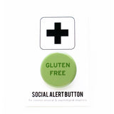 A round light green 1.25" pinback button that reads GLUTEN FREE in darker green text. Button is on a Social Alert Button backing card.