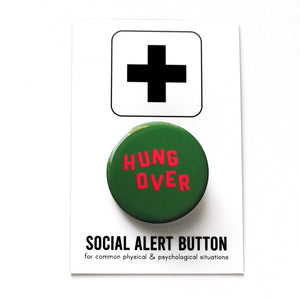 A round dark green pinback button that reads HUNG OVER in slightly askew neon red letters for a Christmas look. On a Social Alert Button Backing Card.