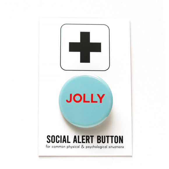 Round, pale blue-green pinback button that reads JOLLY in bright red text.  Button is on a Social Alert Button backing card.