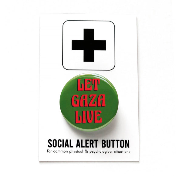 A round rich olive green pinback button with art nouvous font that reads LET GAZA LIVE in red, with a black drop shadow. Button is on a Social Alert Button branded backing card with a plus sign at the top.