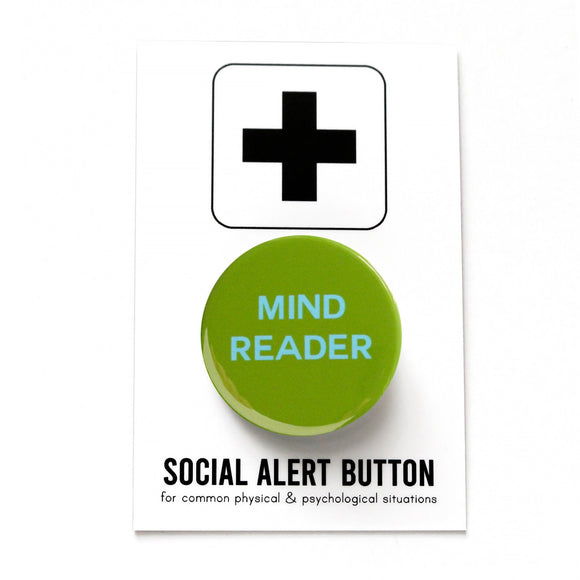 Round mossy lime green pinball button that reads MIND READER in light blue text. Badge is on a Social Alert Button backing card.