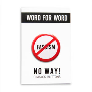 FASCISM in black text with a red circle and slash around it, to indicate being against FASCISM. Button is held in a hand.