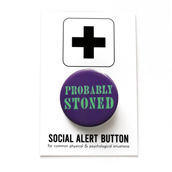 Round dark purple pinback button that reads PROBABLY STONED in minty green text. Button is pinned to a Social Alert Button backing card.