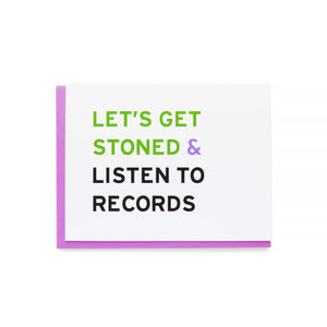 A horizontal white greeting card that reads LET'S GET STONED & LISTEN TO RECORDS in green, violet & black san serif text. Set with a violet purple envelope.