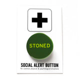 Round pinback button that says STONED. Light green text on a dark green background. Button is pinned to a Social Alert Button backing card