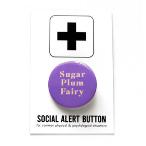 Round purple lavender pinback button that reads SUGAR PLUM FAIRY in rich cream text. On a Social Alert Button backing card.