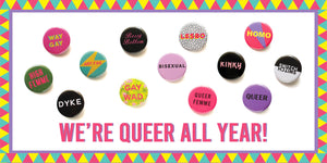 Text says "We're Queer All Year". 12 queer theme buttons are scattered on the page.