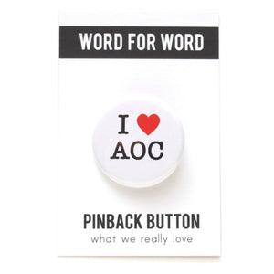 Round pinback button on a white background that says I love AOC. Love is depicted by a red heart.  The other text is black.