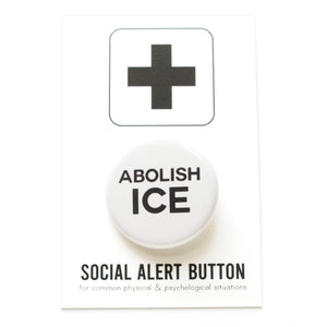 Round pinback button that says ABOLISH ICE. Black text on a white background. The button is pinned to a Social Alert Button backing card.