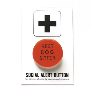 Round orange-brown pinback button that reads BEST DOG SITTER in a thin black font. Button is on a Social Alert Button backing card.