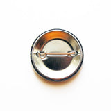 Metal back of a pinback button