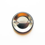 Back of a metal pinback button