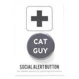 Round pinback button that says CAT GUY. White text on a grey background.