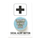 Round pinback button that says CLIMATE CHANGE NOW. White text on a light blue background.