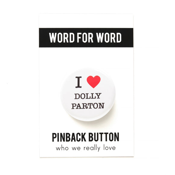 White pinback button that reads I red heart Dolly Parton. Button is on a Word for Word backing card.