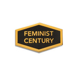 Hexagon shaped hard enamel lapel pin that says FEMINIST CENTURY.  Gold text and outline on a black background. 
