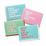 Four rich pastel holiday christmas cards with sans serif font, reading left to right: HAVE YOURSELF A QUEER LITTLE CHRISTMAS is a rich pastel teal with white text and a pink drop shadow. MAKE THE YULETIDE GAY is a rich pink card with white text and a mint green drop shadow. DECK THE HALLS WITH EQUALITY is a medium green-blue color with red text and a white drop shadow. ’TIS THE SEASON TO BE STONED is a medium light green with white text and a red drop shadow, all on a white background