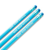 Three sky blue pencils with blue erasers and ferrules.  Hot foil stamped with the words HERE GOES NOTHING.