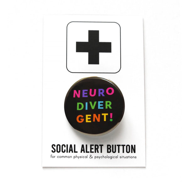 Round, black pinback button that reads NEURO-DIVER-GENT! In three lines with varied bright colors in an askew sans serif font. Button is on a Social Alert Button backing card.
