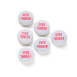 Six gray & pink over thinker buttons arranged in a triangle.