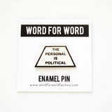 Trapezoid shaped pin that says THE PERSONAL IS POLITICAL on a Word For Word backing card.