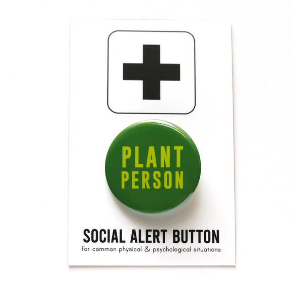 vivid medium green round pinback button, which reads PLANT PERSON in a neon green san serif  font. Button is on a Social Alert Backing Card.