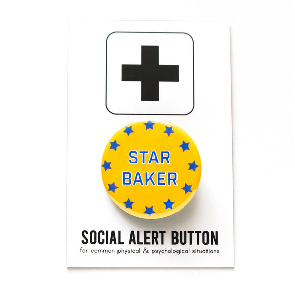 Round rich yellow pinback button that reads STAR BAKER in a blue san serif font with thin white outline, and border for blue stars. Pinback button is on Social Alert Button Backing Card