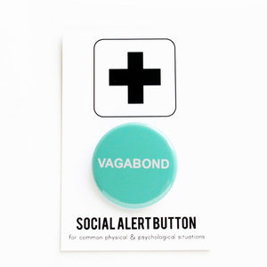 Round pinback button that says Vagabond. White text on a light teal background. Button is pinned to a Social Alert Button backing card